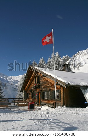 Snowy mountain cafe in winter time, Alps, Switzerland
