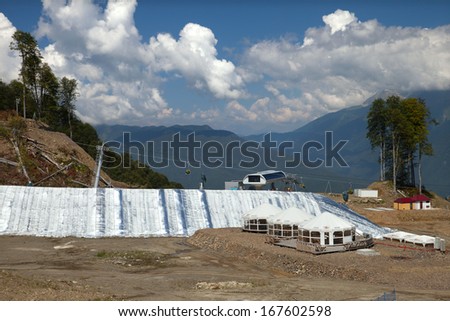 SOCHI, RUSSIA - AUGUST 08:  The keeping of last year snow for 2014 Olympic Games in Sochi on AUGUST 08, 2013. Finnish company Snow Secure will provide 500 snow guns ready to produce artificial snow.