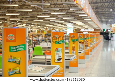 KRASNOGORSK, RUSSIA - MAY 17, 2014:  Checkout lane of Globus supermarket. The Globus supermarket in Krasnogorsk was opened at 30th November of 2013