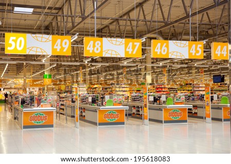 KRASNOGORSK, RUSSIA - MAY 17, 2014:  Checkout lane of Globus supermarket. The first Globus supermarket in Russia was opened in 2006.