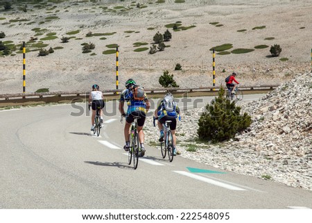 MONT VENTOUX, FRANCE - JUNE 16, 2014: Cyclists on road to top of Ventoux mount in south France