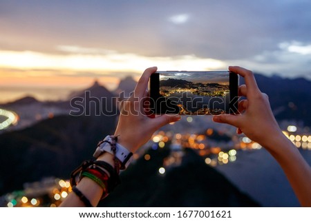 Taking a photo on a mobile phone camera of Rio de Janeiro, Brasil. Foto stock © 