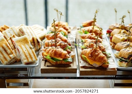 Stacks of croissant sandwich at event Foto stock © 