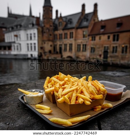 Similar – Foto Bild Belgische Pommes frites mit Sauce Andalouse