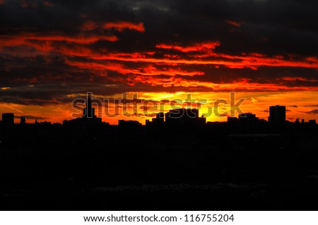 Sunset Glow and Silhouetted skyline of Moscow It is the stunning sunset glow of Moscow. The Silhouette of Moscow skyline and skyscrapers are so beautiful. Triumph Palace is is the highest in europe.