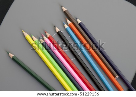 palette of colored pencils in row
