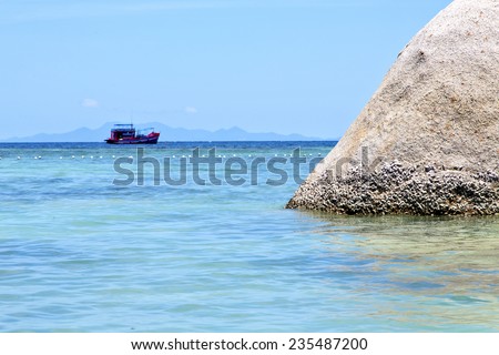 asia  kho tao  bay isle white  beach    rocks pirogue  in thailand and south china sea
