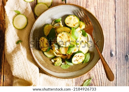 Similar – Foto Bild Hausgemachte Zucchini-Spaghetti mit Pestosauce, Brokkoli und Kirschtomaten