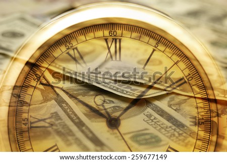 Time is money.  Clock in US dollars Clock, shot with very shallow depth of field