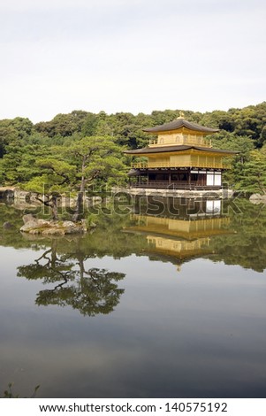 Reflections of the zen buddhist Temple of the Golden Pavilion (kinkaku-ji), Kyoto, Japan.