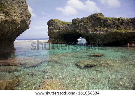 Natural arch over one of the Limu pools, Niue, South Pacific.