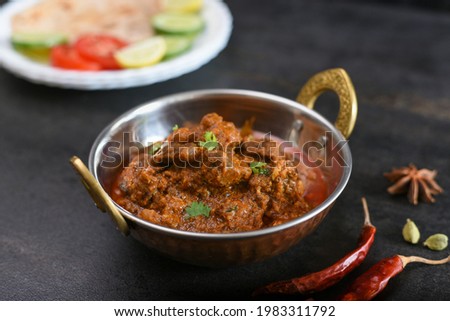 Spicy Sri Lankan beef curry, Goan style beef vindaloo , Traditional Indian Lamb or beef curry . spicy Beef curry gravy popular in Kerala Sri Lanka Goa side dish for Appam, porotta roti bread in India.
