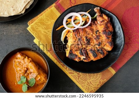 Arabian grilled chicken also called Al Faham or Alfaham or Djaj very popular recipe in Middle East. Made using mix Bezar spices and barbeque in a charcoal grill or in oven. Stok fotoğraf © 