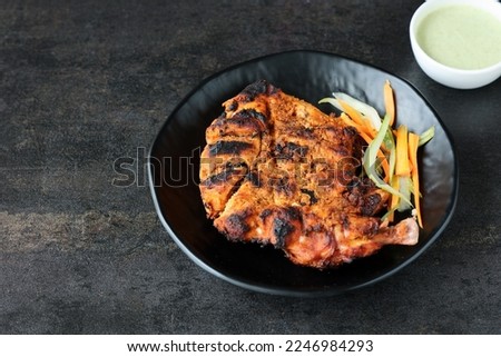 Arabian grilled chicken also called Al Faham or Alfaham or Djaj very popular recipe in Middle East. Made using mix Bezar spices and barbeque in a charcoal grill or in oven. Stok fotoğraf © 