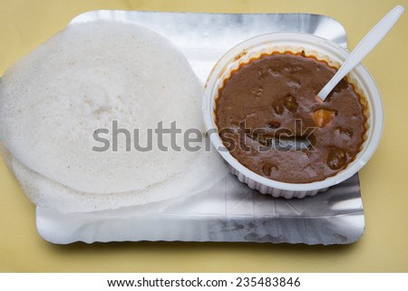 appam with beef curry Kerala India breakfast