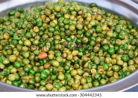 roasted nuts with salt pepper masala, pulses snacks India, street food channa masala dal green peas