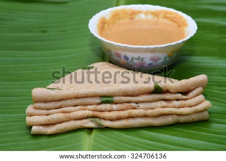 Pile of  Wheat Dosa/ goduma dosa, Low fat South Indian dish best with the coconut chutney. easy to make meal for breakfast. crepe made from wheat in Andhra Pradesh, Karnataka, Tamil nadu, Kerala