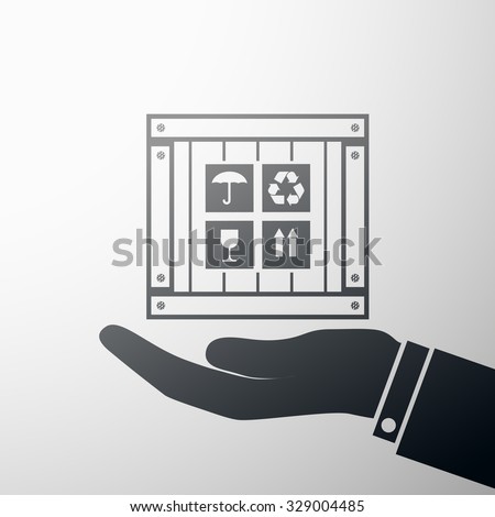Human hand holding a wooden box. Stock vector illustration.