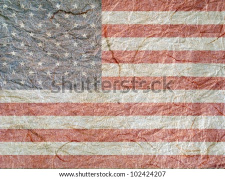 Faded USA flag overlaid over textured paper.