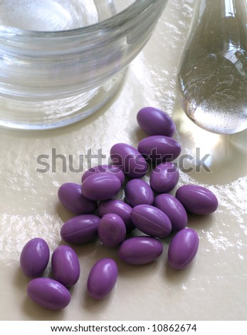 Glass mortar and pestle with vitamin pills