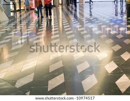 Patterned shiny floor inside of shopping mall