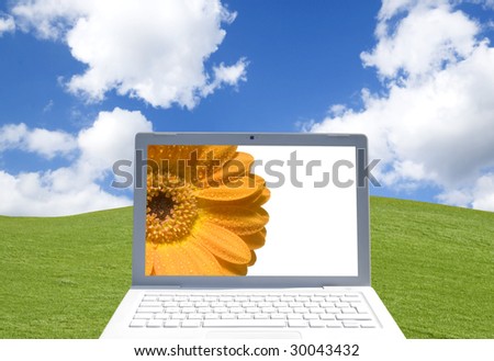 Close-up of laptop computer in rural setting