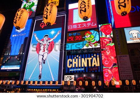 OSAKA,JAPAN- July 10 :Night view of the neon advertisements Numba on July 10, 2015 in Osaka, Japan.Is famous for its historic theatres,and restaurants, and its many neon and mechanised signs
