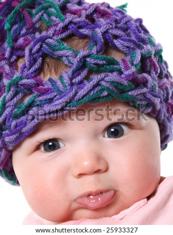 cute baby in hat pouting
