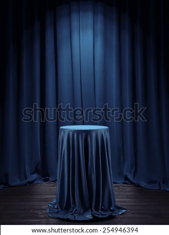 Table covered with blue cloth in interior