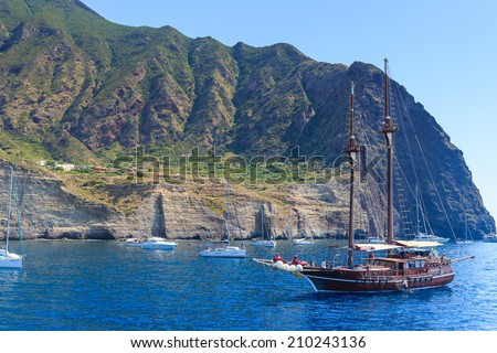 FILICUDI, AEOLIAN ISLANDS - JULY 2014 : A group of sailing yachts are moored close to the Filicudi island