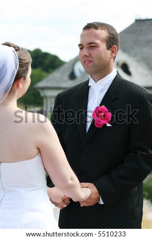 Bride and Groom exchanging wedding vows