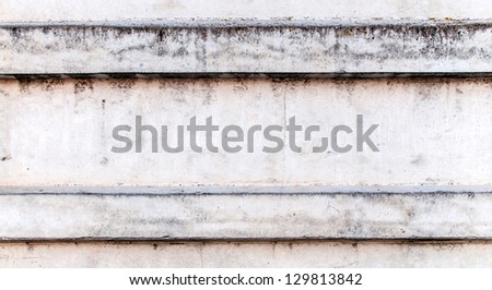 texture of concrete wall with parallel ledges