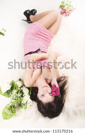 natural beauty portrait woman with flower in the hands