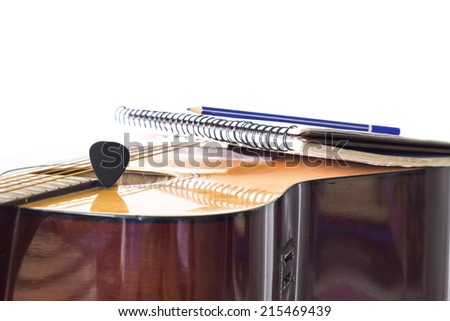 guitar and pencil for create music select focus
