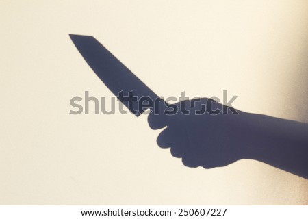 Hand Shadow with Kitchen Knife