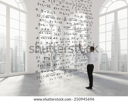 Person write math formula in an empty space