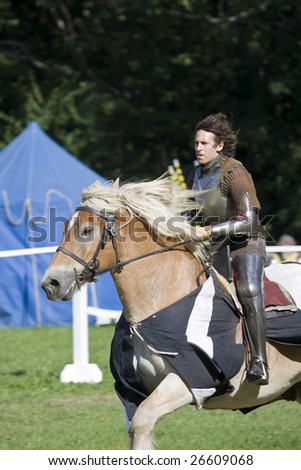 PORT WASHINGTON, NY - SEPTEMBER 15: A performer rides a horse during a Medieval Festival on September 15, 2007 in Port Washington, New York.