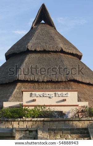 Tropical straw roof house of meeting point