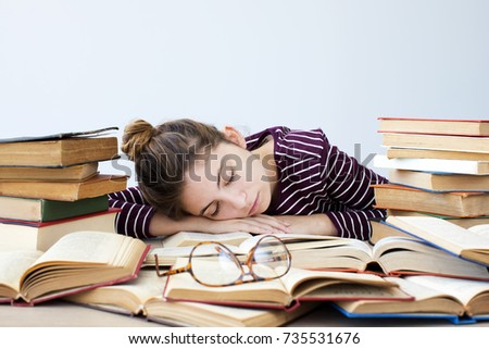 Image, Stock Photo Person falls asleep while reading a book in bed and drops the book. Concept of being bored at home with copy space.