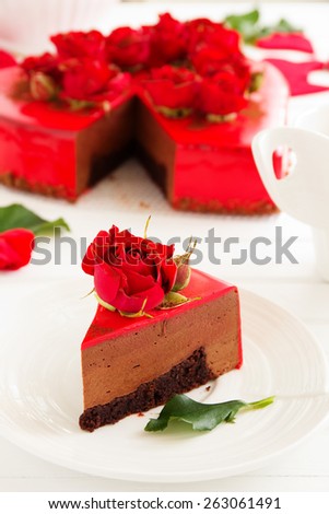 Chocolate and strawberry mousse cake in the shape of heart.