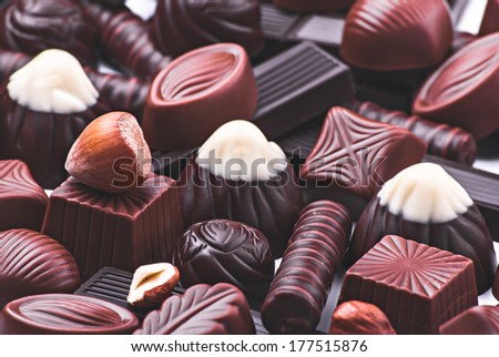Assorted Chocolate pralines as background