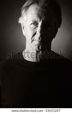 Low Key Shot of a Handsome Senior Man