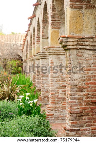 brick arches and gardens at Mission San Juan Capistrano