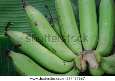 raw banana on banana leaf