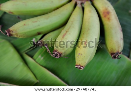 raw banana on banana leaf