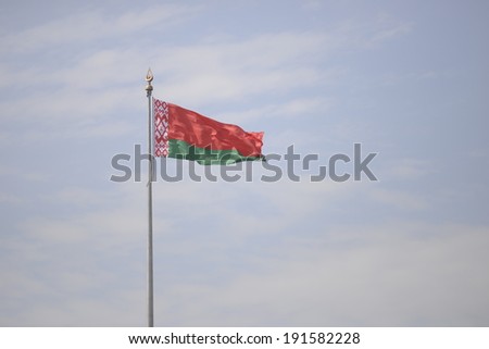 MINSK, BELARUS - MAY 8: Belarussian flag in area of the national flag of the Republic of Belarus on May 8, 2014 in Minsk, Belarus.