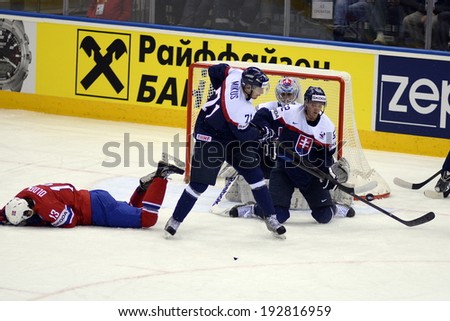 MINSK, BELARUS - MAY 14: Olden Sondre #13 of Norway lyin on ice during  the IIHF World Championship match between Norway and Slovakia at Chizhovka Arena on May 14, 2014 in Minsk, Belarus.