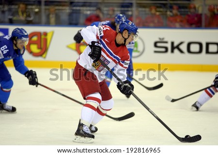 MINSK, BELARUS - MAY 14: Czech Republic's Hudler Jiri #24 skates up the ice with puck during preliminary round action at the 2014 IIHF Ice Hockey World Championship on May 14, 2014 in Minsk, Belarus.