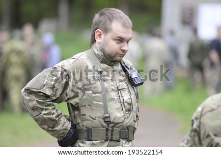 ZASLAWYE, BELARUS - MAY 17: Player looks on during Laser Tag IT-CUP tournament at abandoned summer camp on May 17, 2014 in Zaslawye, Belarus.