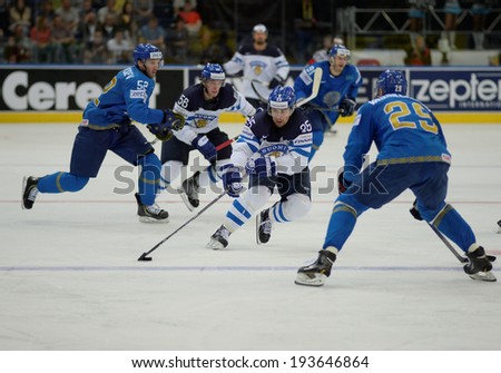 MINSK, BELARUS - MAY 19: JORMAKKA Pekka (25) of Finland skates with the puck during 2014 IIHF World Ice Hockey Championship match at Minsk Arena on May 19, 2014 in Minsk, Belarus.